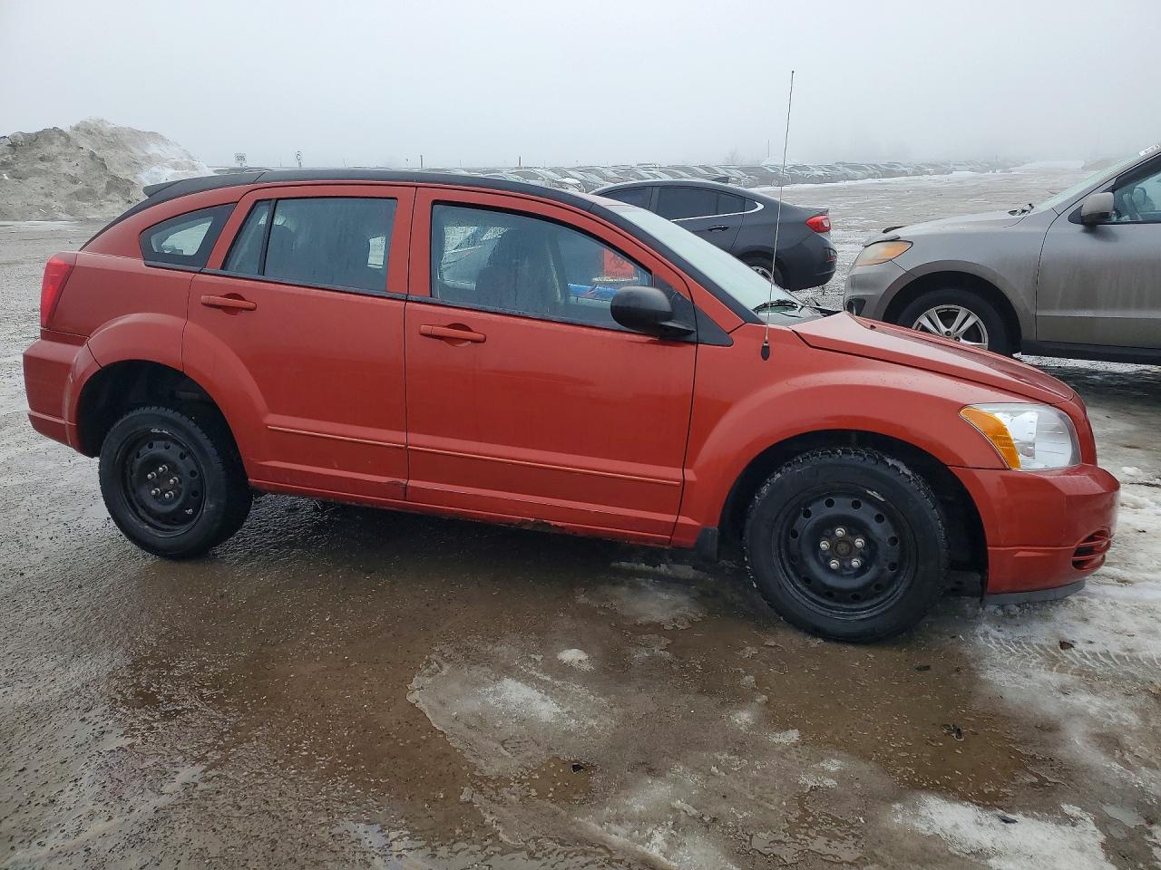 1B3HB48A19D210387 · 2009 DODGE CALIBER · 4/12