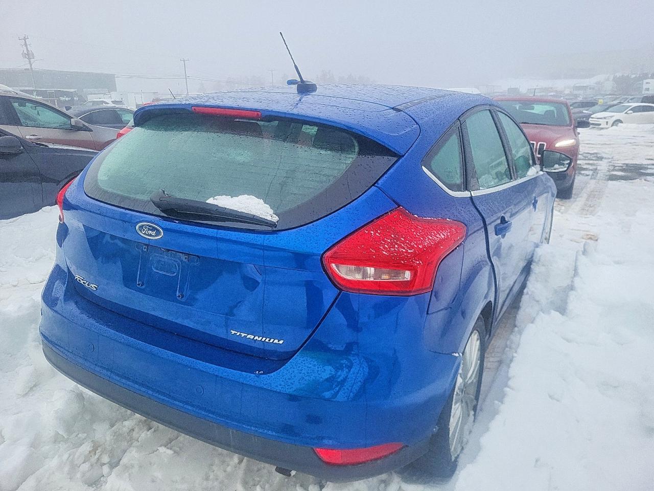 1FADP3N22JL296377 · 2018 FORD FOCUS · 3/12