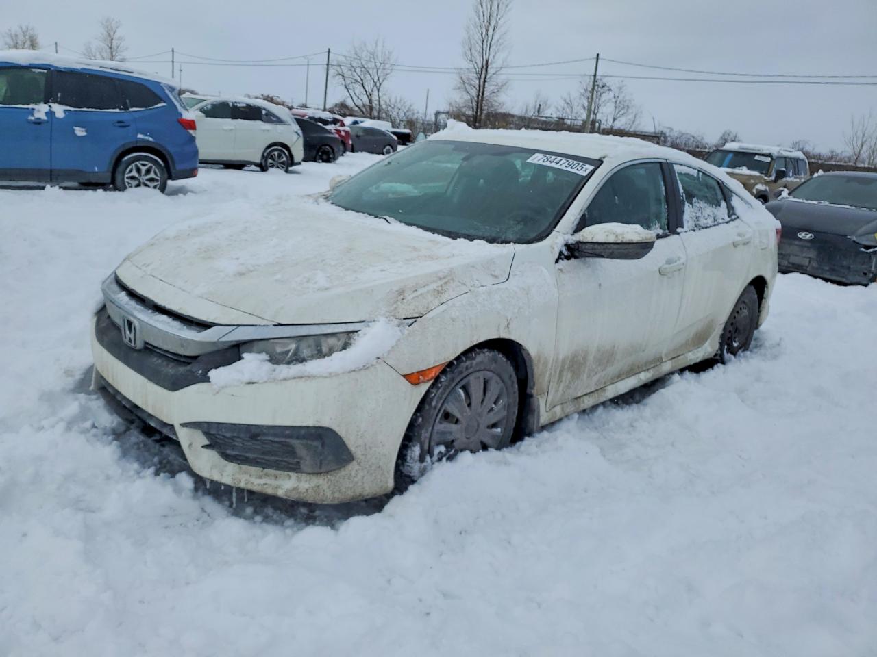 2HGFC2F58HH037144 · 2017 HONDA CIVIC