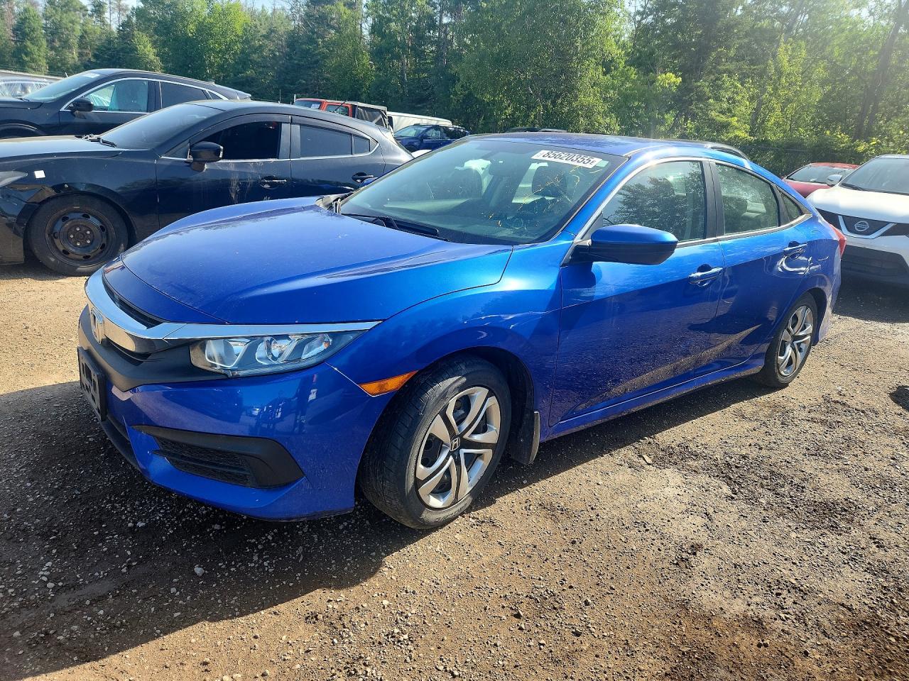 2HGFC2F55HH001458 · 2017 HONDA CIVIC