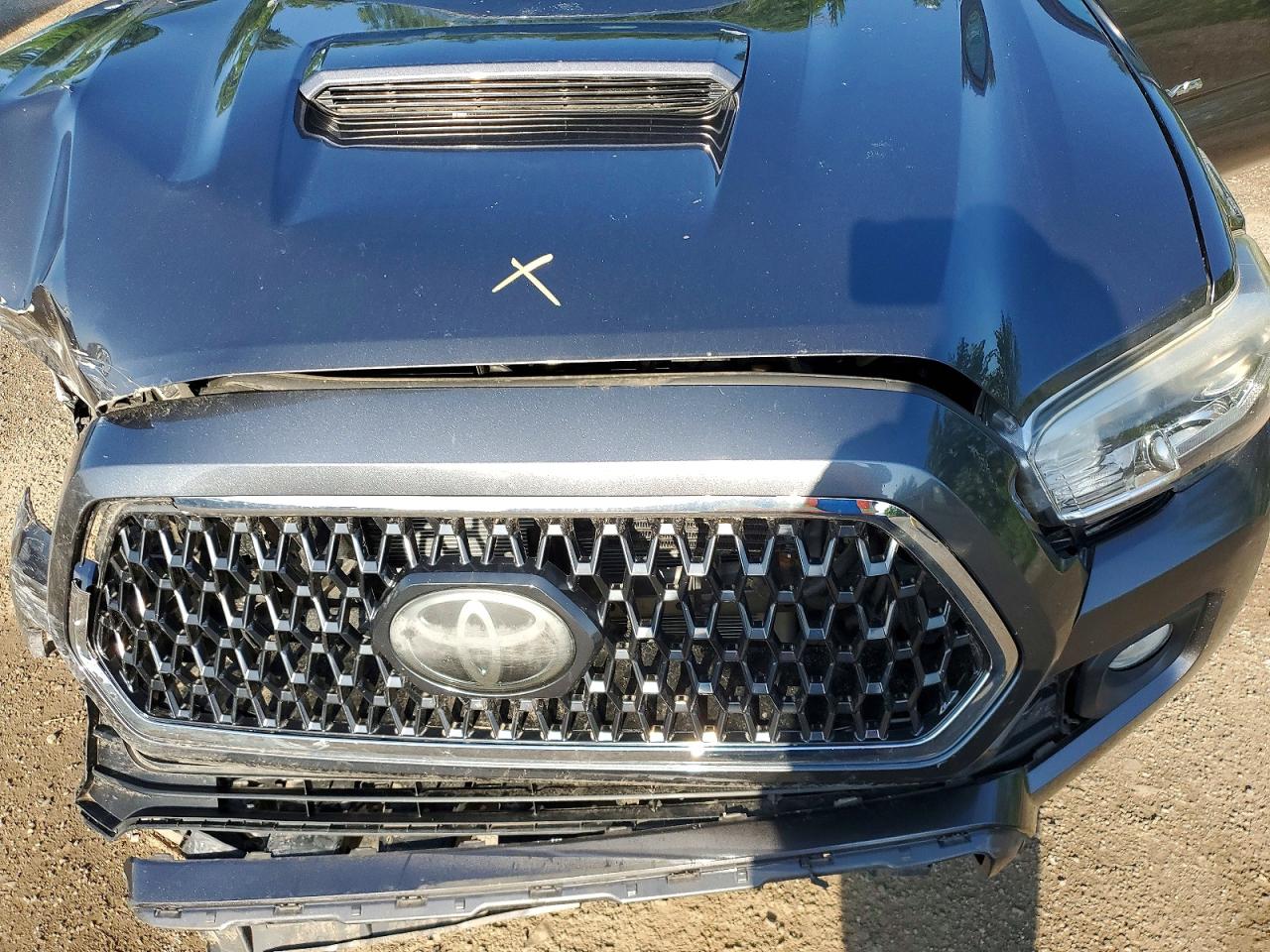 5TFDZ5BN8JX033186 · 2018 TOYOTA TACOMA · 11/12