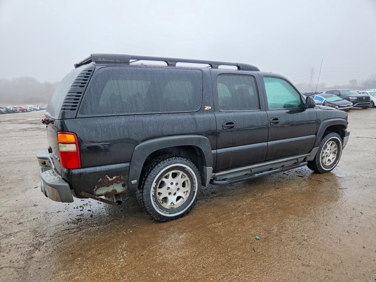 3GNFK16Z63G241813 · 2003 CHEVROLET SUBURBAN · 3/14