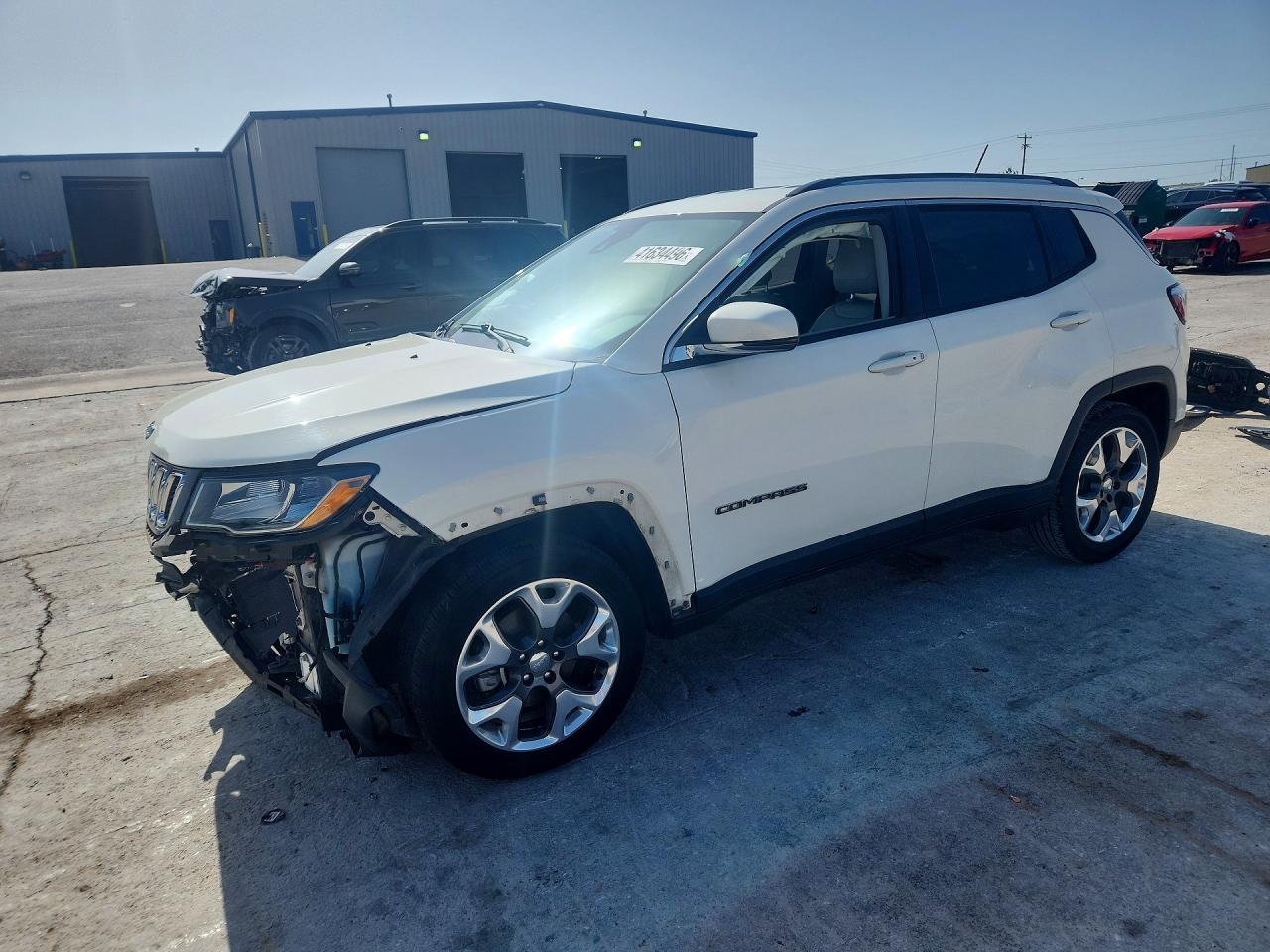 3C4NJCCB6MT522318 · 2021 JEEP COMPASS