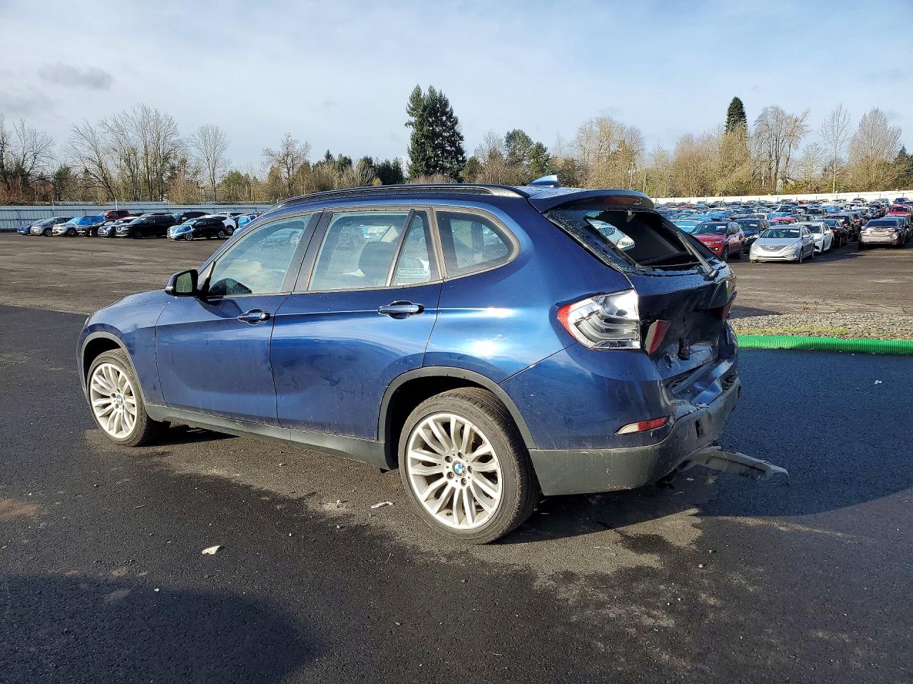 WBAVL1C54EVY21667 · 2014 BMW X1 · 2/12