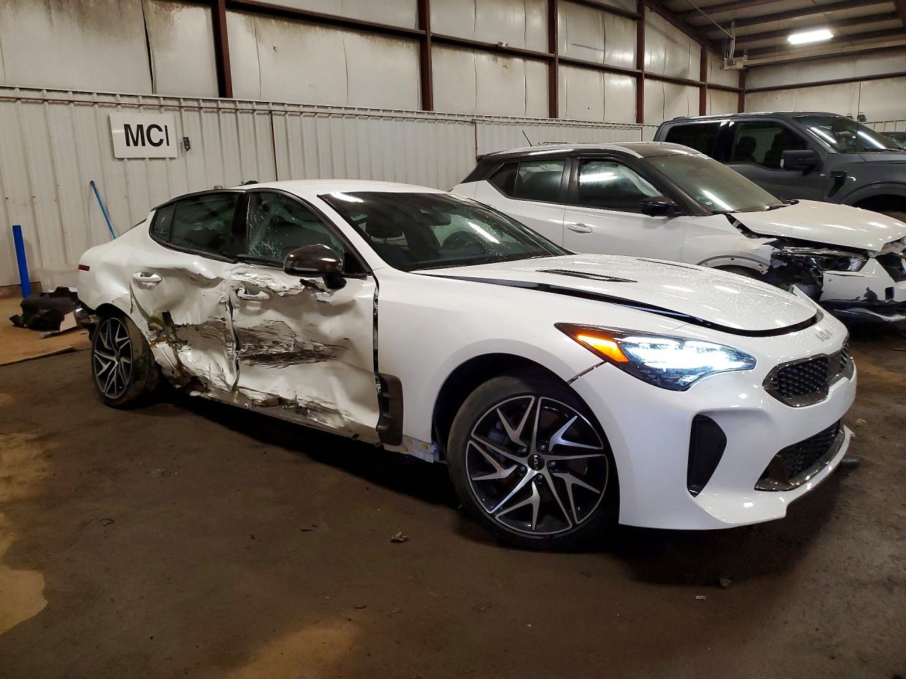 KNAE35LD3N6103391 · 2022 KIA STINGER · 4/13