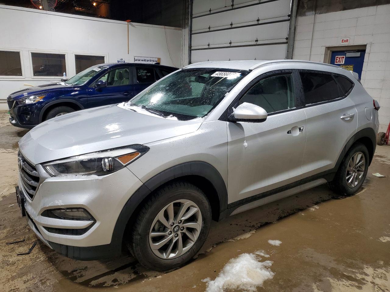 KM8J33A42JU693237 · 2018 HYUNDAI TUCSON
