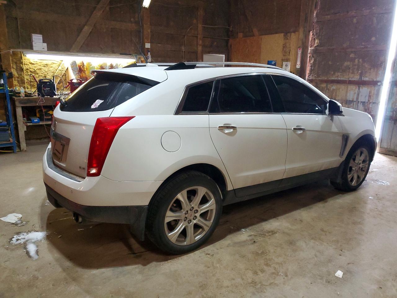 3GYFNJE32DS557747 · 2013 CADILLAC SRX · 3/14