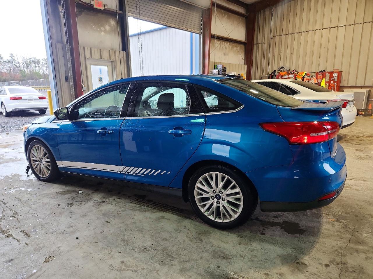 1FADP3J21GL363761 · 2016 FORD FOCUS · 2/12
