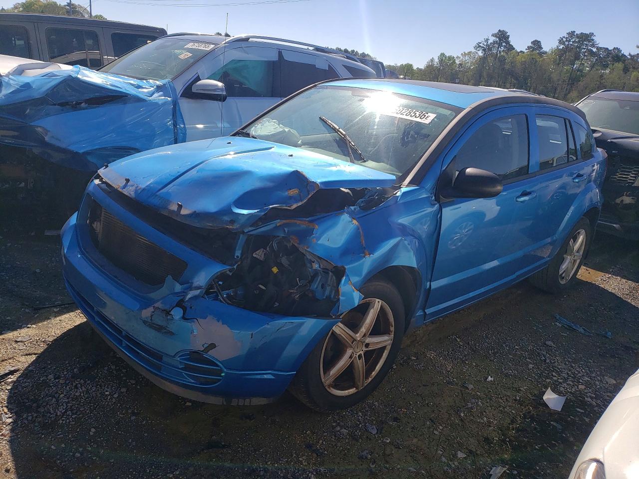 1B3HB48A49D150203 · 2009 DODGE CALIBER