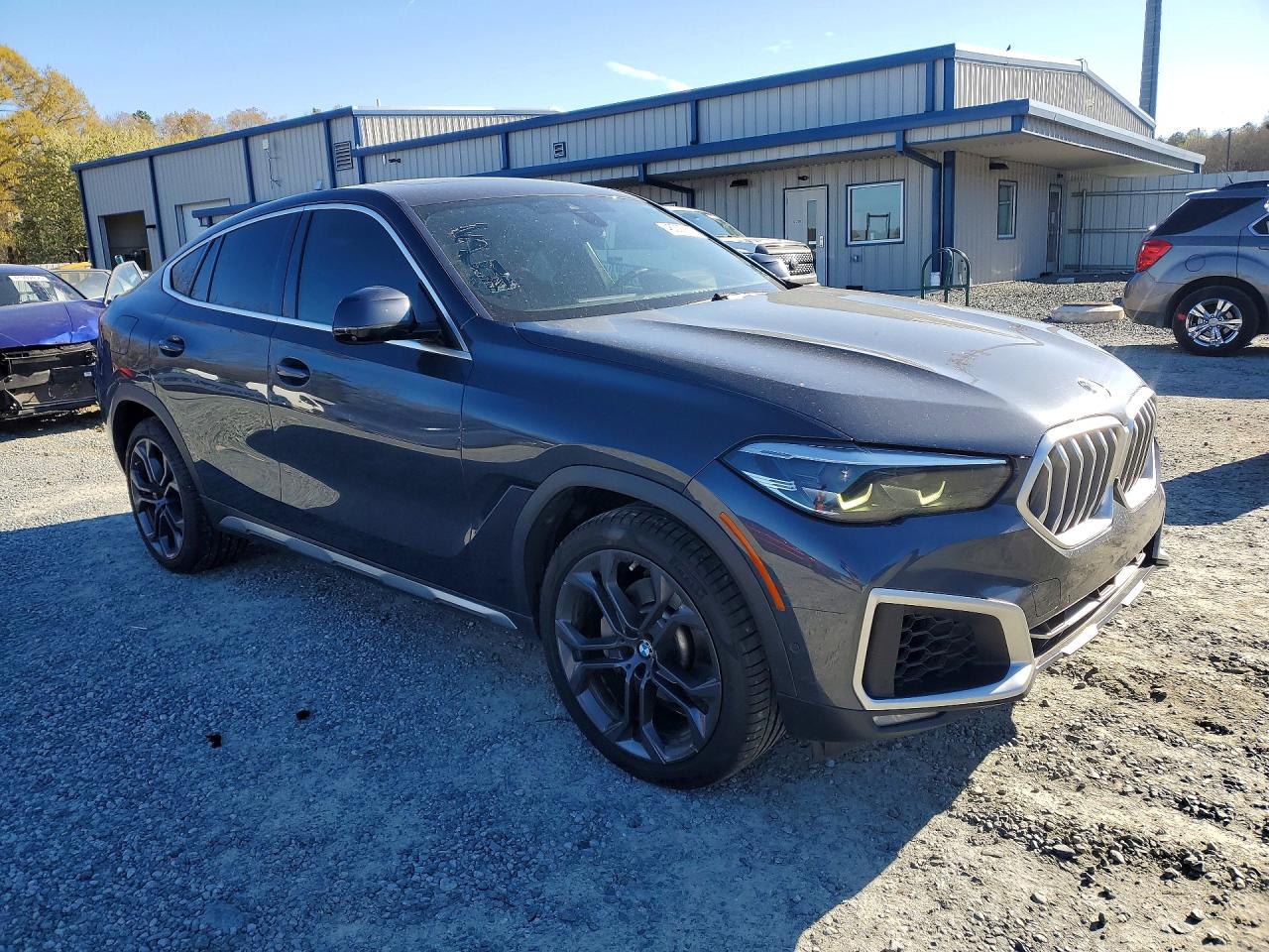 5UXCY6C03L9C97111 · 2020 BMW X6 · 4/13