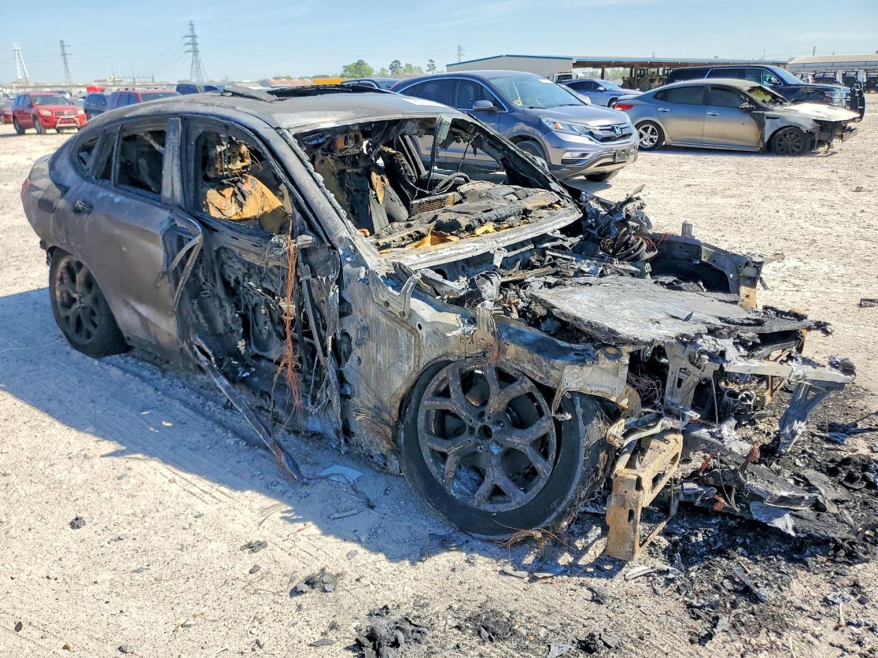 5UX2V1C02L9B63780 · 2020 BMW X4 · 4/12