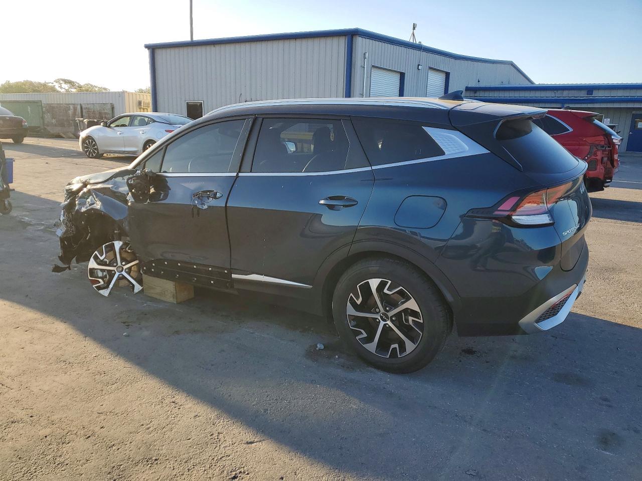 KNDPVCAG3P7116419 · 2023 KIA SPORTAGE HYBRID · 2/14