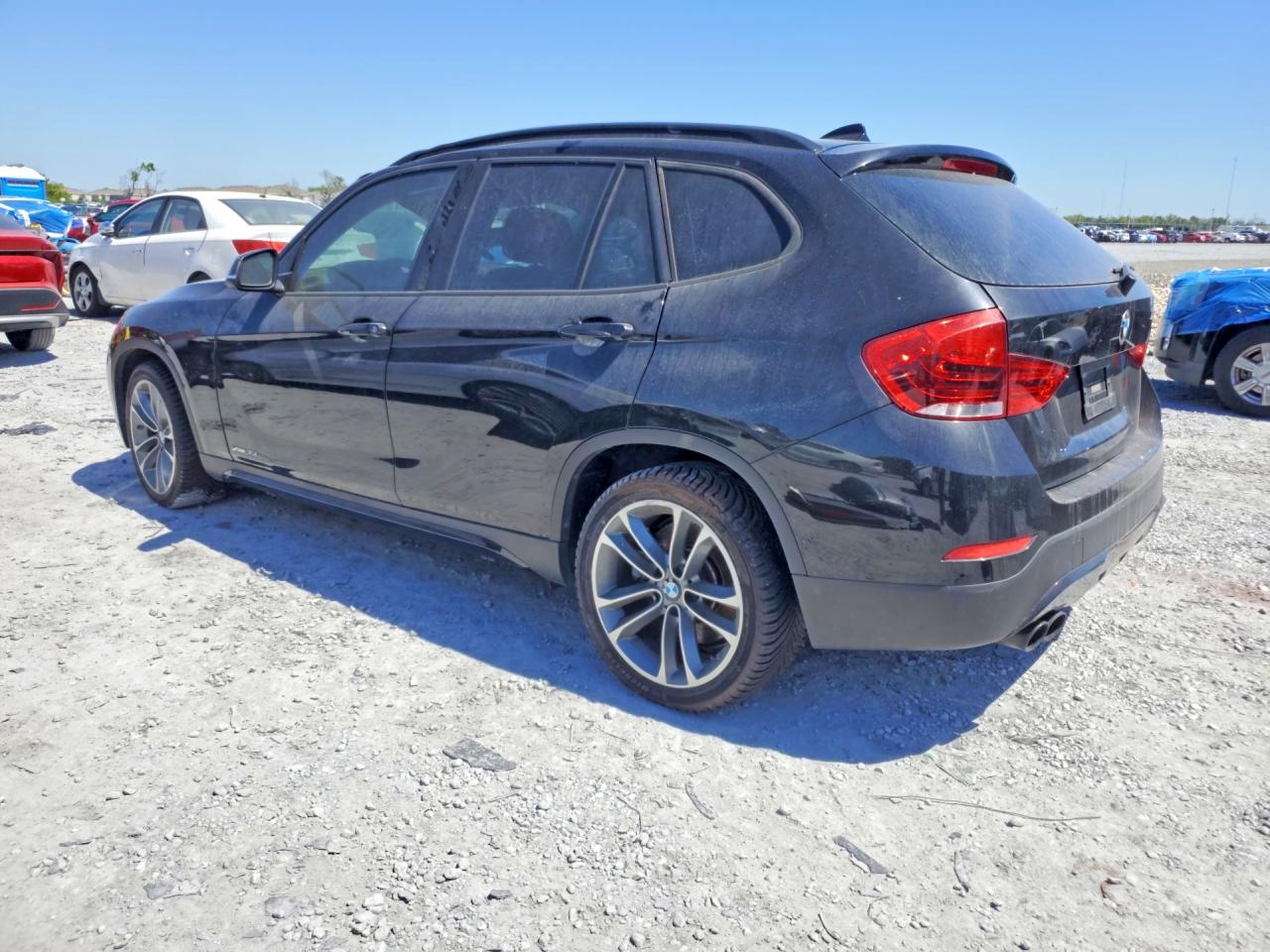 WBAVM5C52DVL63968 · 2013 BMW X1 · 2/13