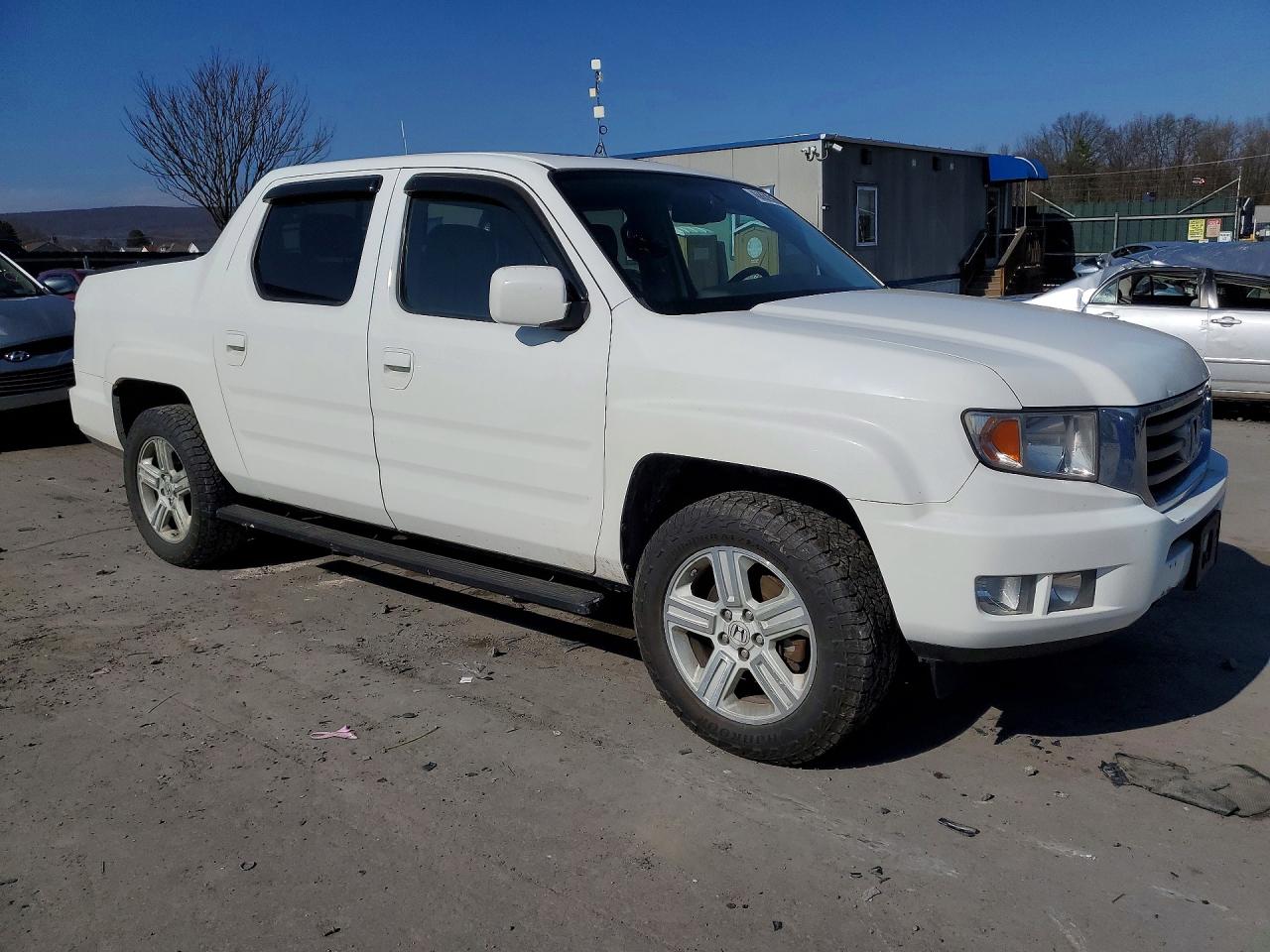 5FPYK1F50EB004183 · 2014 HONDA RIDGELINE · 4/12