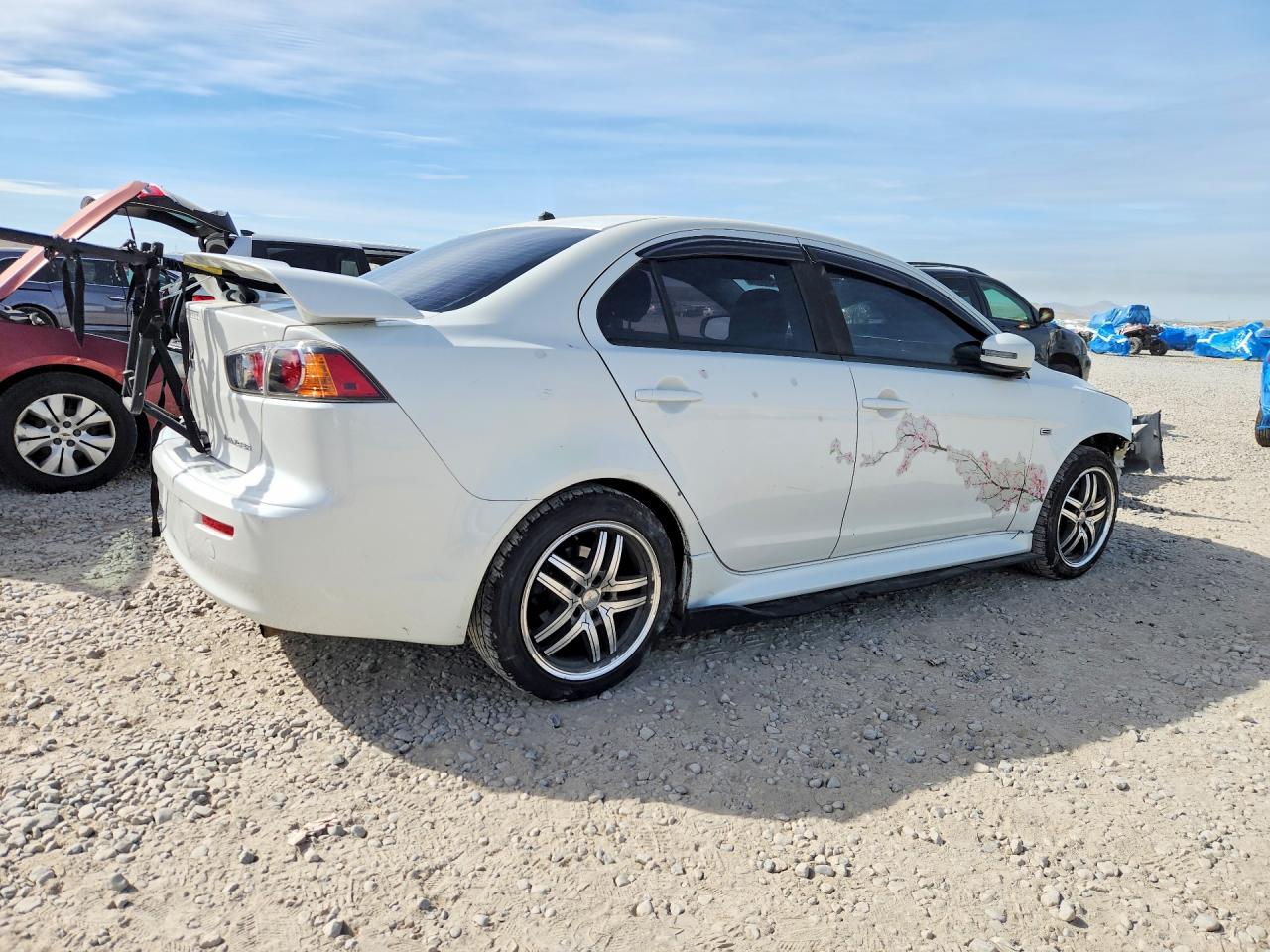 JA32U2FU4GU007182 · 2016 MITSUBISHI LANCER · 3/13