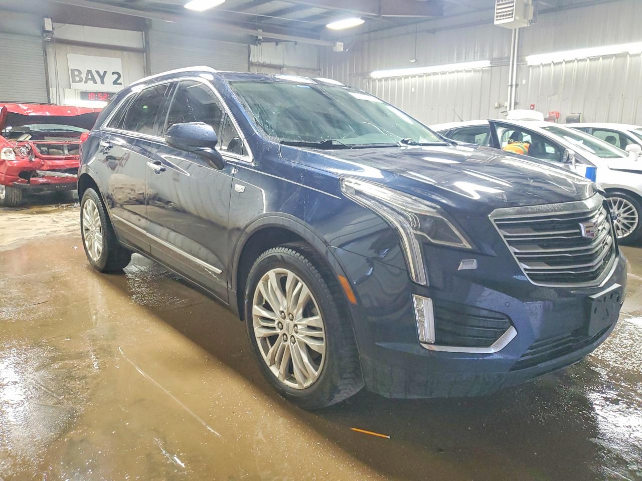 1GYKNERS2HZ148146 · 2017 CADILLAC XT5 · 4/12