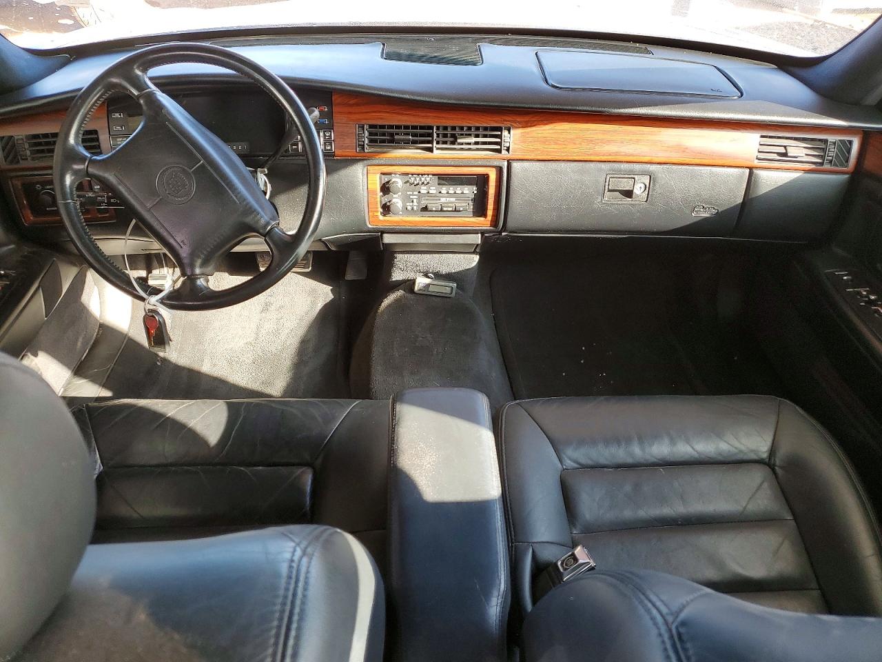 1G6KD52B5RU301431 · 1994 CADILLAC DEVILLE · 8/12