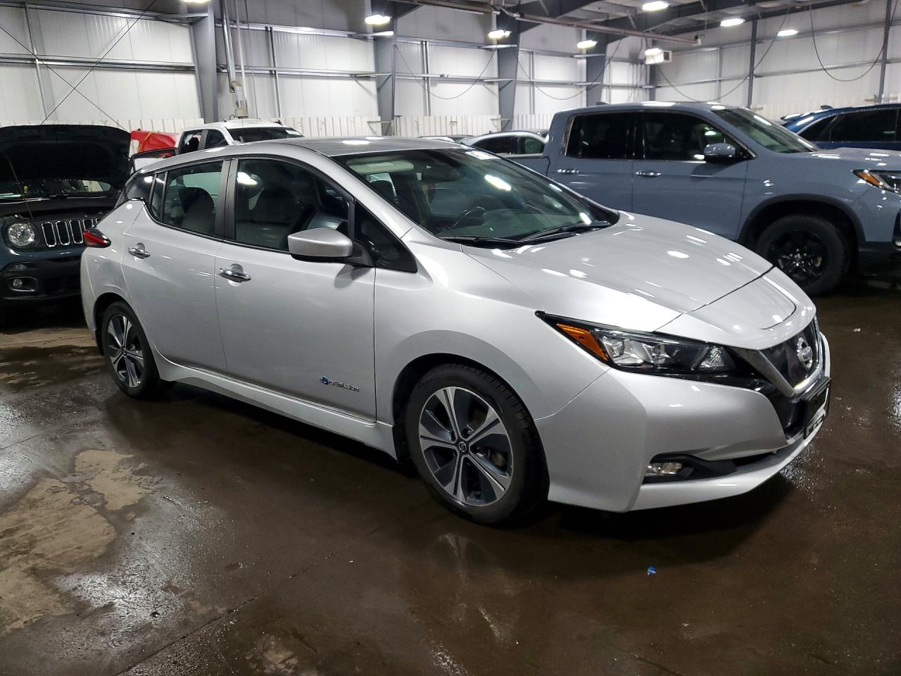 1N4AZ1CP9JC314583 · 2018 NISSAN LEAF · 4/12
