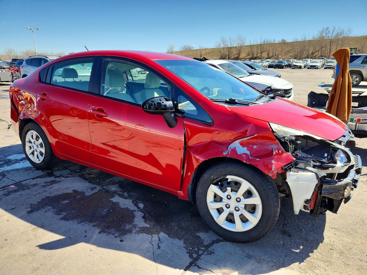 KNADM4A35D6309985 · 2013 KIA RIO · 4/12