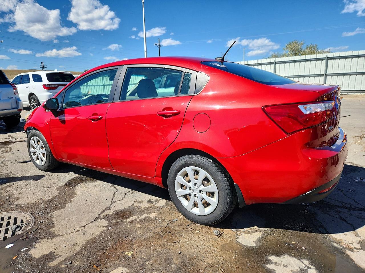 KNADM4A35D6309985 · 2013 KIA RIO · 2/12