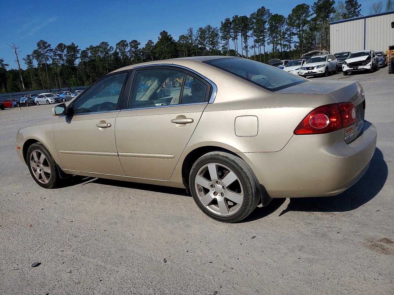 KNAGE123385226588 · 2008 KIA OPTIMA · 2/12