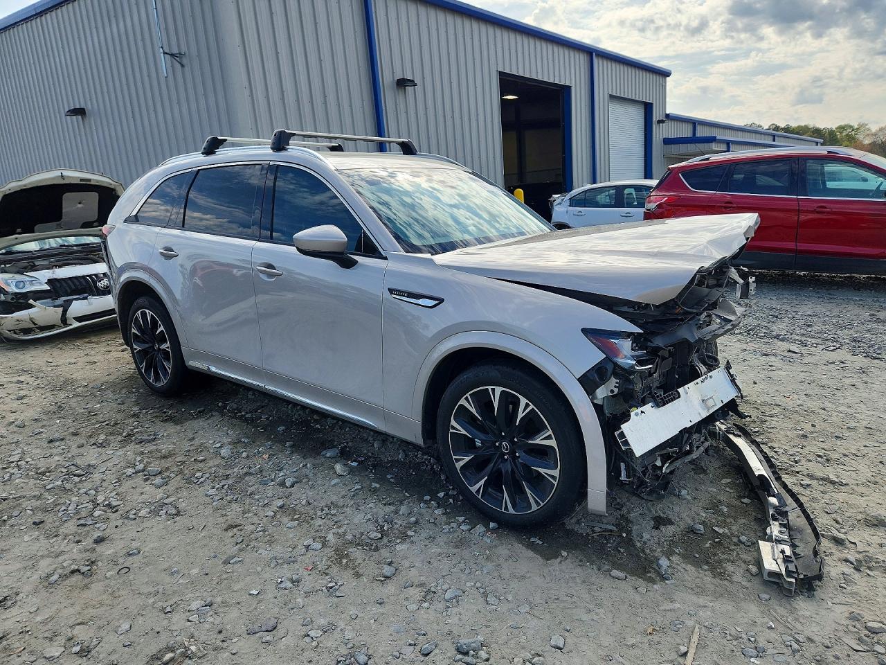 JM3KKEHC1S1233839 · 2025 MAZDA CX-90 · 4/14