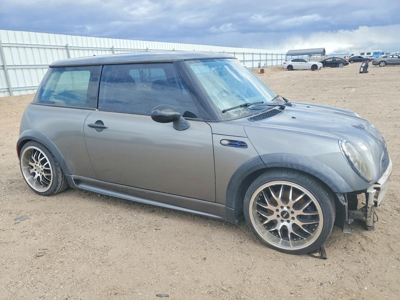 WMWRE33453TD63969 · 2003 MINI COOPER · 4/12