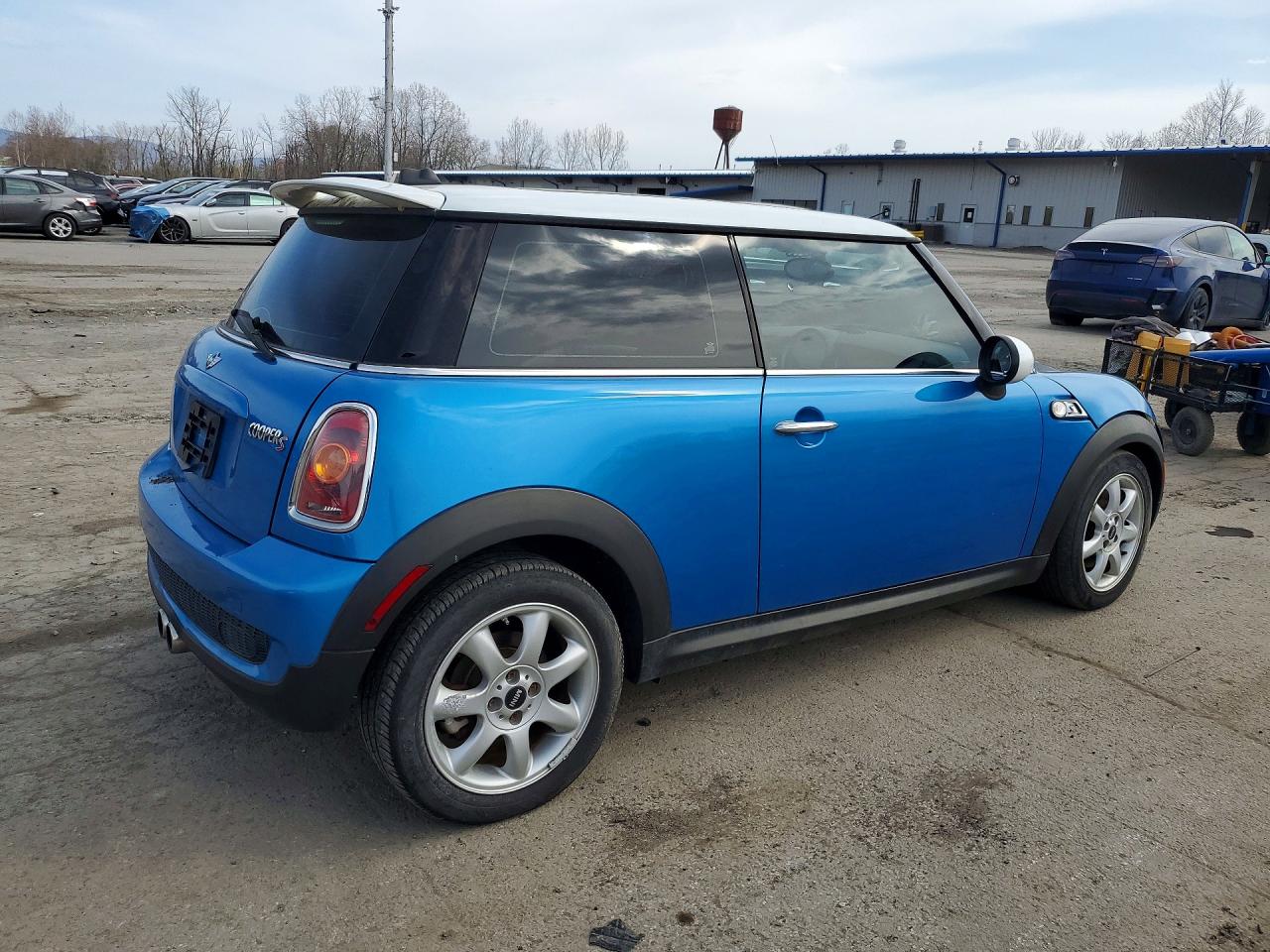 WMWMF73589TW87141 · 2009 MINI COOPER · 3/12