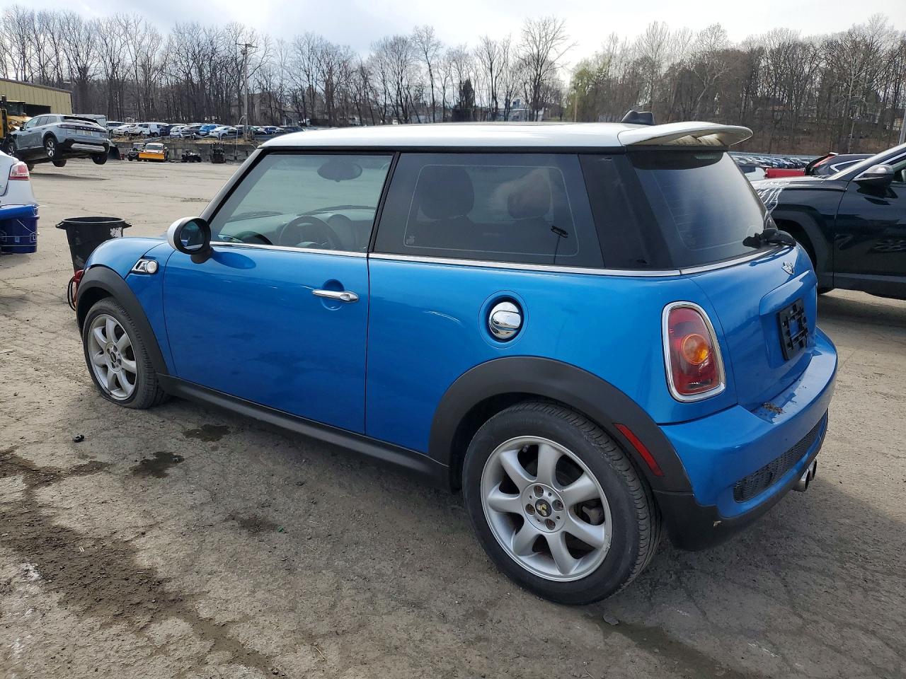 WMWMF73589TW87141 · 2009 MINI COOPER · 2/12
