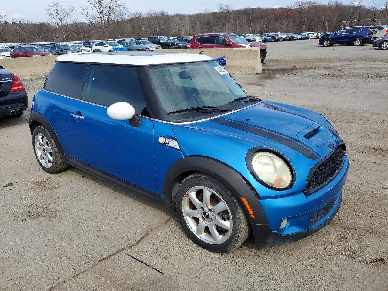 WMWMF73589TW87141 · 2009 MINI COOPER · 4/12