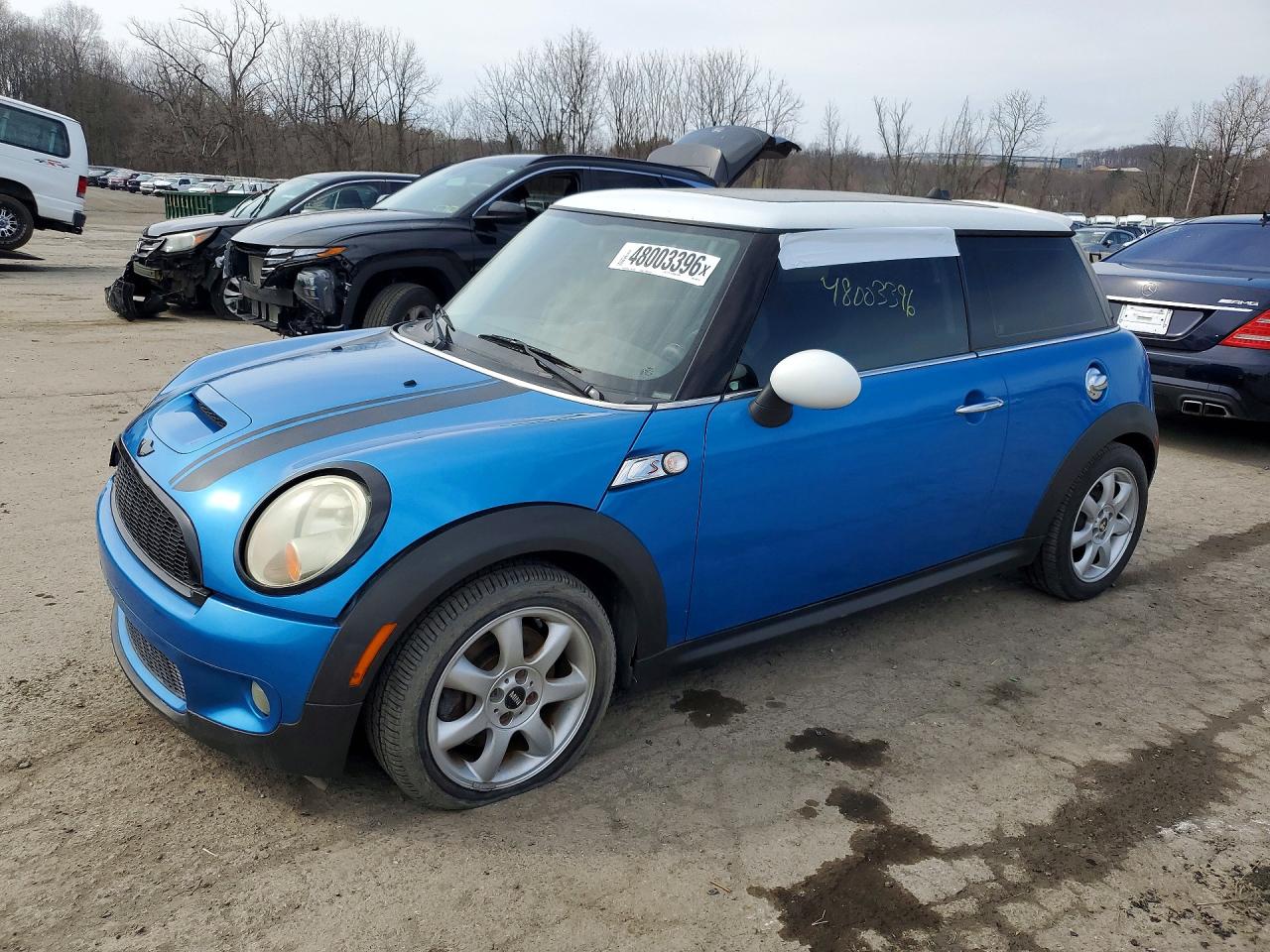 WMWMF73589TW87141 · 2009 MINI COOPER
