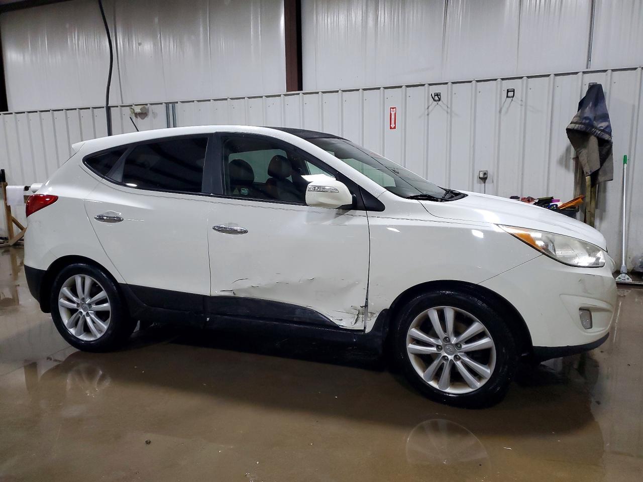 KM8JUCAC0CU454230 · 2012 HYUNDAI TUCSON · 4/13