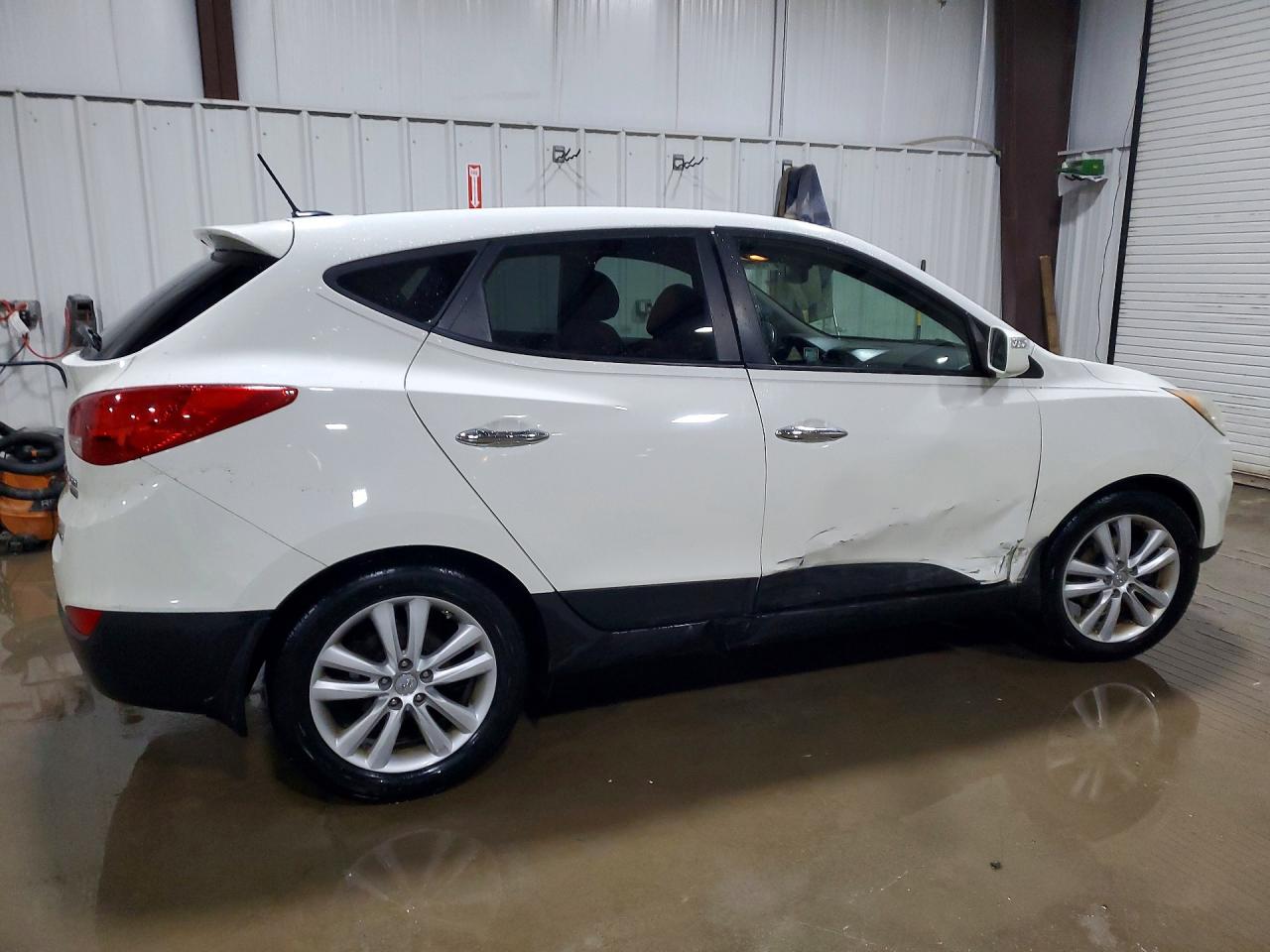 KM8JUCAC0CU454230 · 2012 HYUNDAI TUCSON · 3/13