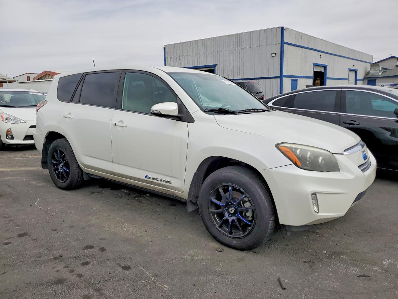 2T3YL4DV6EW002474 · 2014 TOYOTA RAV4 EV · 4/12