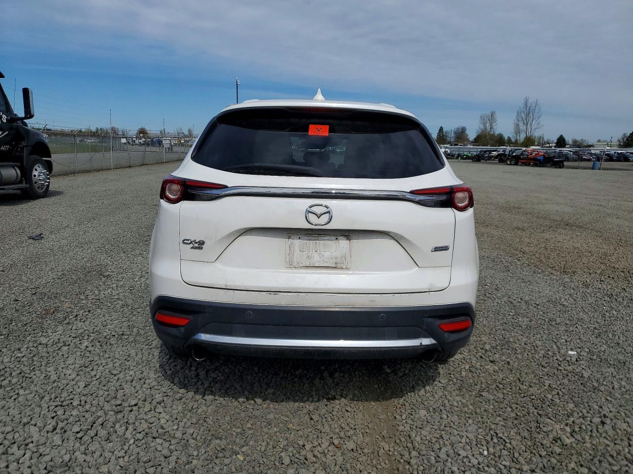 JM3TCBDY9G0116637 · 2016 MAZDA CX-9 · 6/13