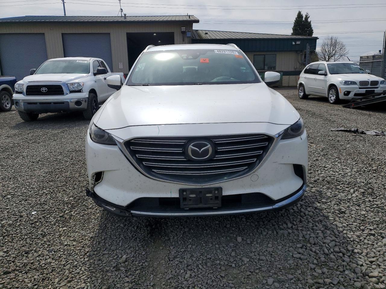 JM3TCBDY9G0116637 · 2016 MAZDA CX-9 · 5/13