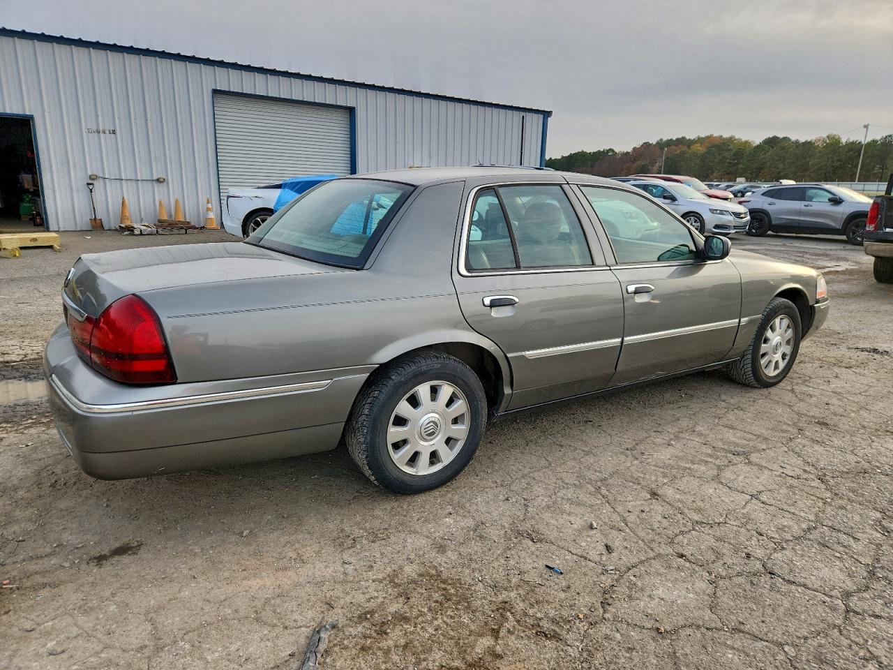 2MHFM75WX4X667235 · 2004 MERCURY GRAND MARQUIS · 3/12