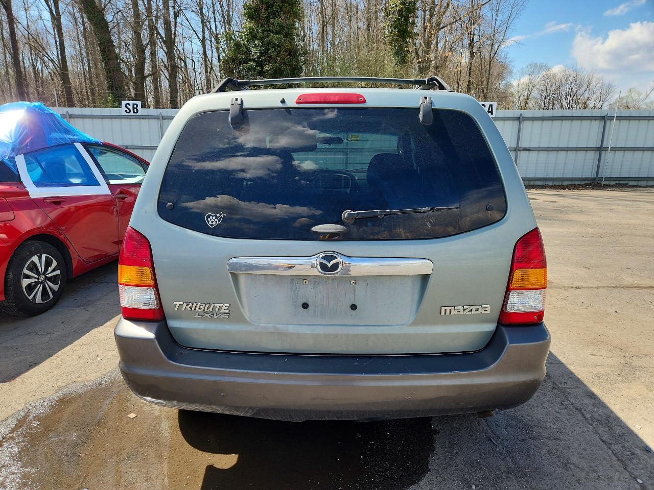 4F2YZ94183KM18587 · 2003 MAZDA TRIBUTE · 6/13