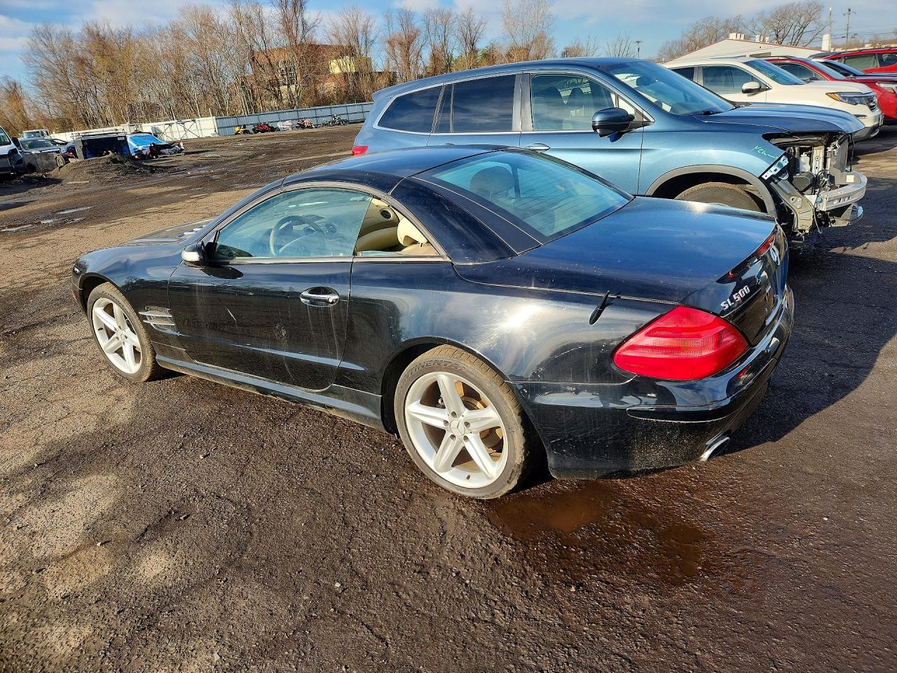 WDBSK75F44F085807 · 2004 MERCEDES-BENZ SL · 2/12
