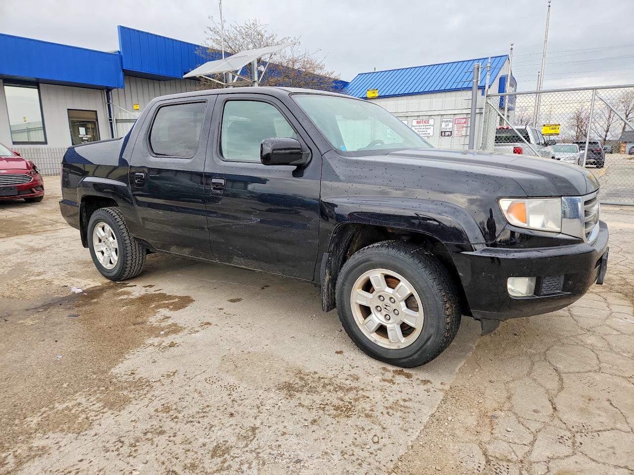 5FPYK1F48DB015387 · 2013 HONDA RIDGELINE · 4/13