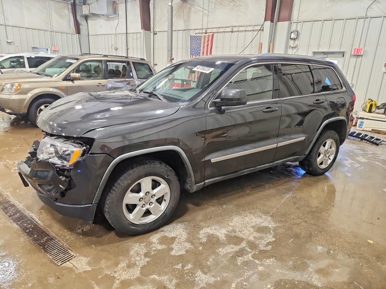 1J4RR4GGXBC720148 · 2011 JEEP GRAND CHEROKEE