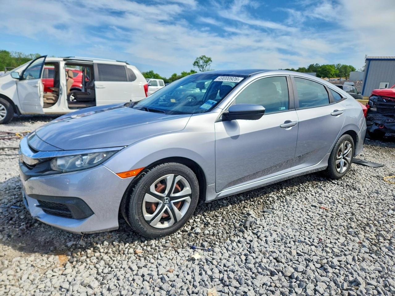 2HGFC2F59JH566723 · 2018 HONDA CIVIC