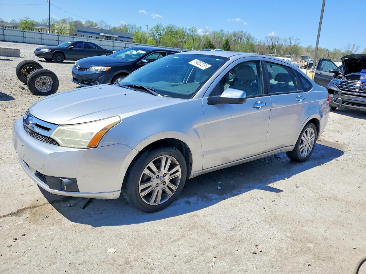 1FAHP3HN1AW212040 · 2010 FORD FOCUS