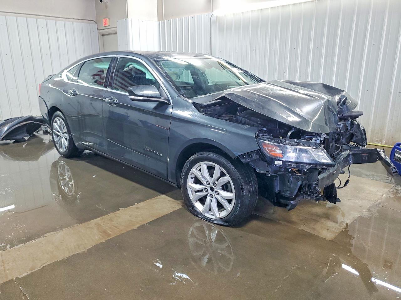 2G1105S32J9121380 · 2018 CHEVROLET IMPALA · 4/13