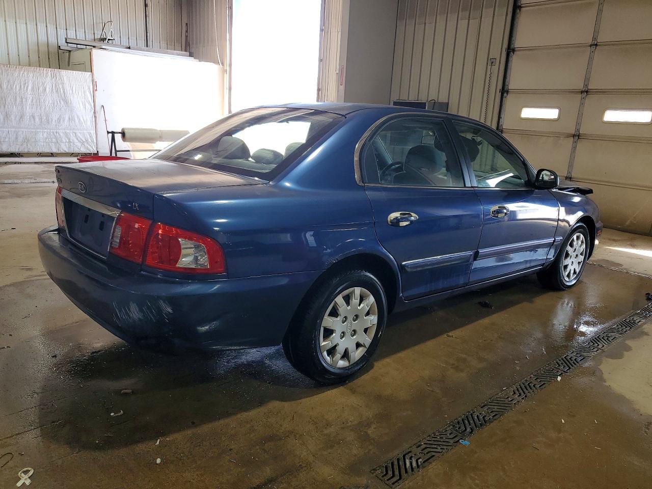 KNAGD126X35214492 · 2003 KIA OPTIMA · 3/13