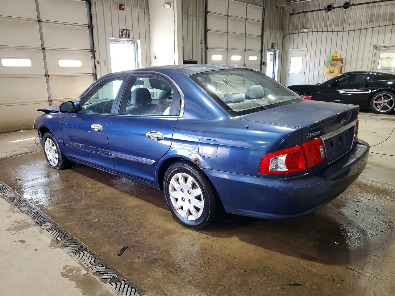 KNAGD126X35214492 · 2003 KIA OPTIMA · 2/13