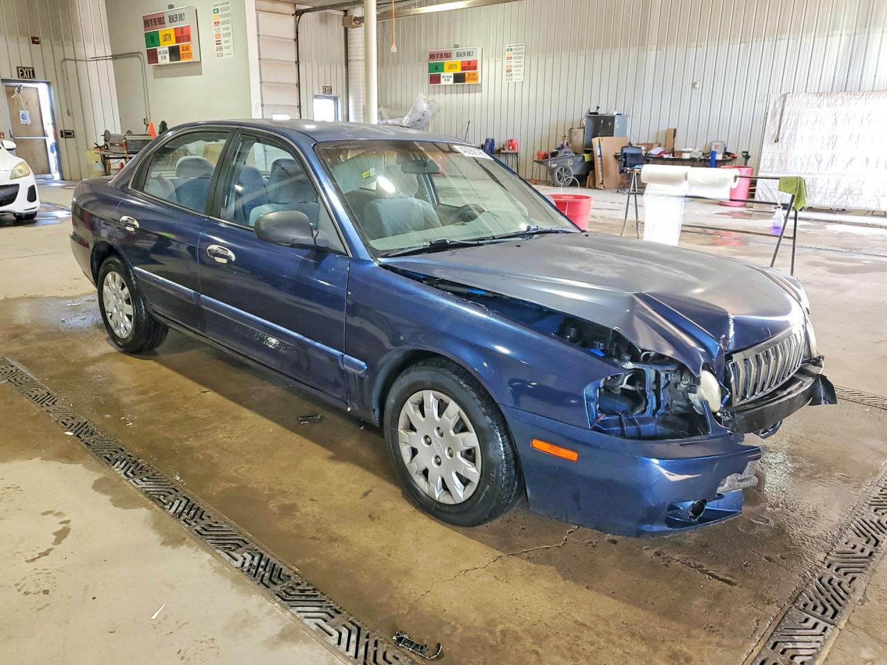 KNAGD126X35214492 · 2003 KIA OPTIMA · 4/13
