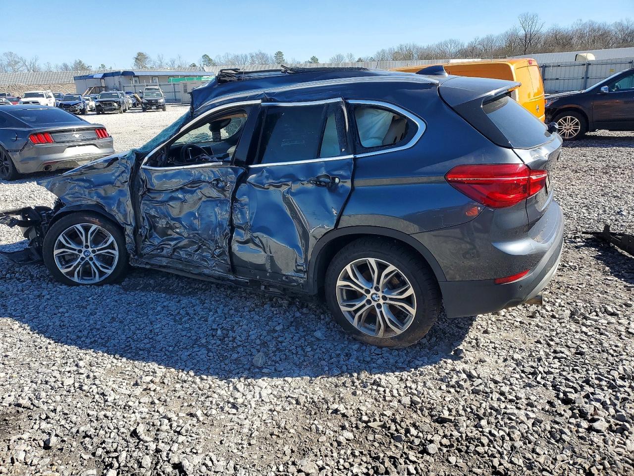 WBXHT3C37G5E53388 · 2016 BMW X1 · 2/13