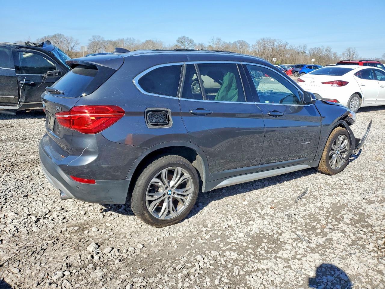 WBXHT3C37G5E53388 · 2016 BMW X1 · 3/13
