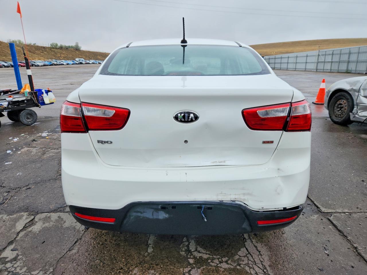 KNADM4A38D6290767 · 2013 KIA RIO · 6/12